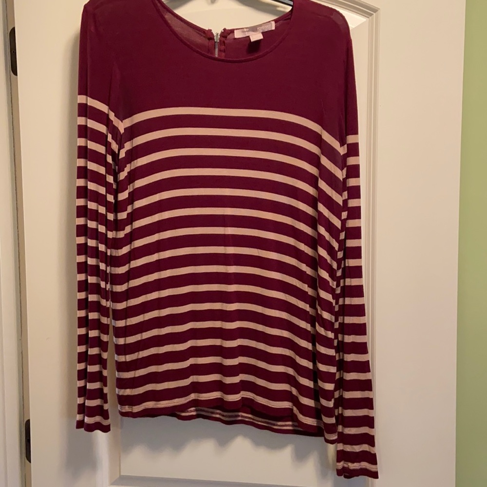 Maroon with tan stripes. Back zipper.